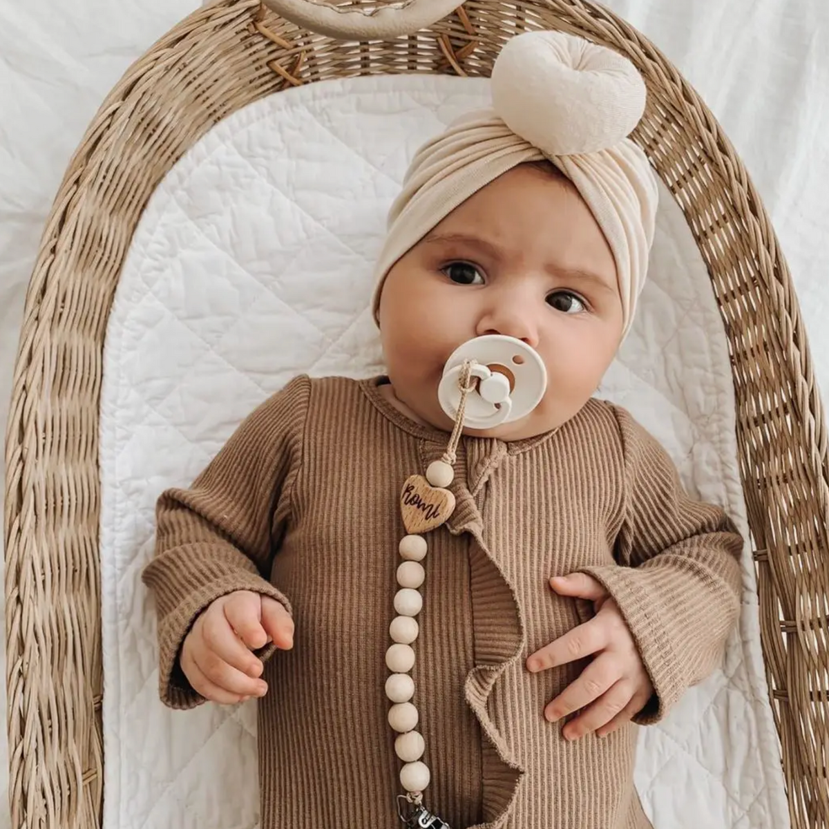 ruffle footed onesie | cappuccino