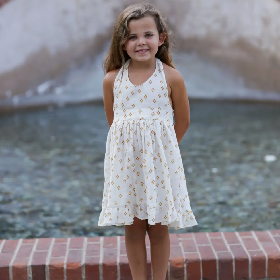 halter dress in cream with diamond pattern
