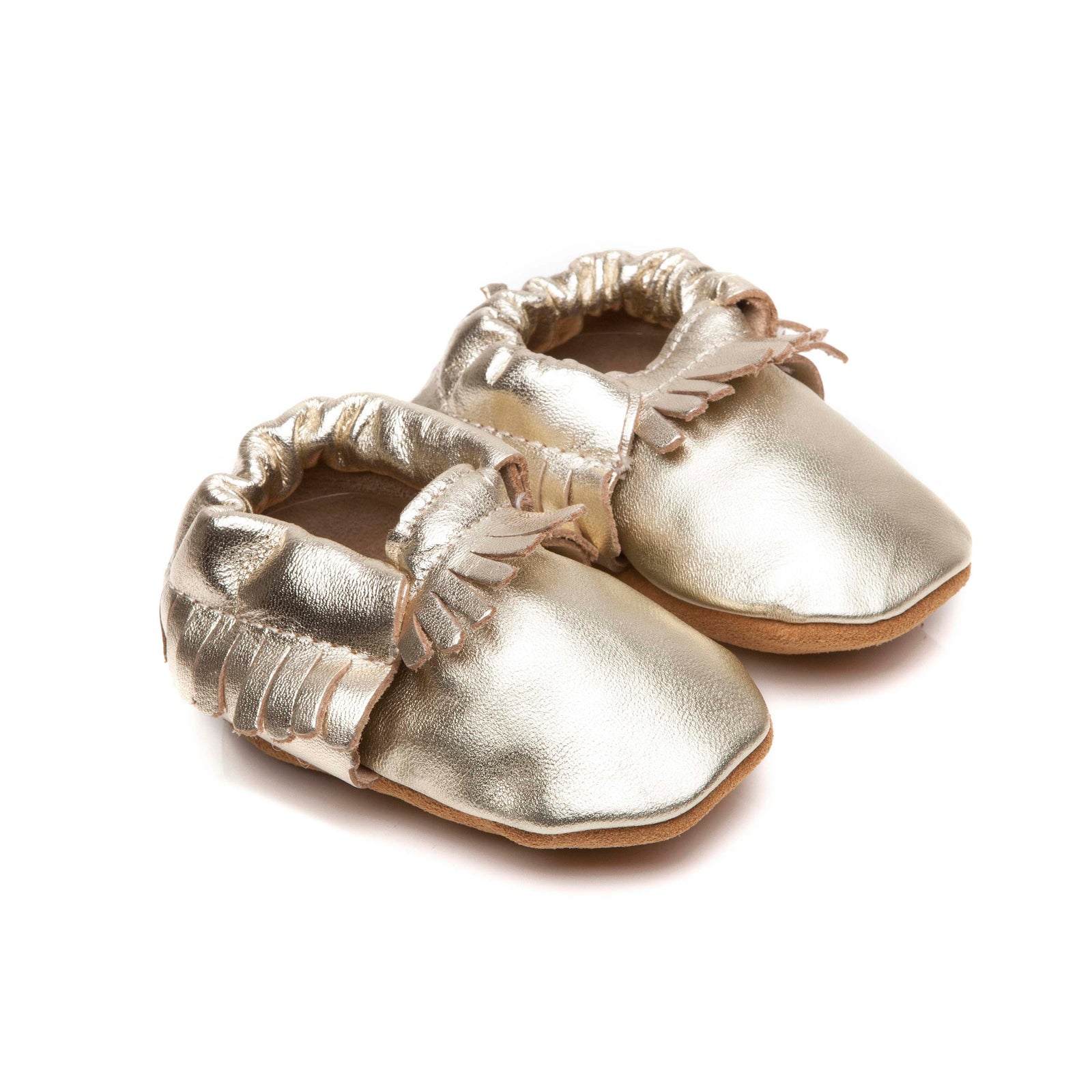 baby moccasins in gold