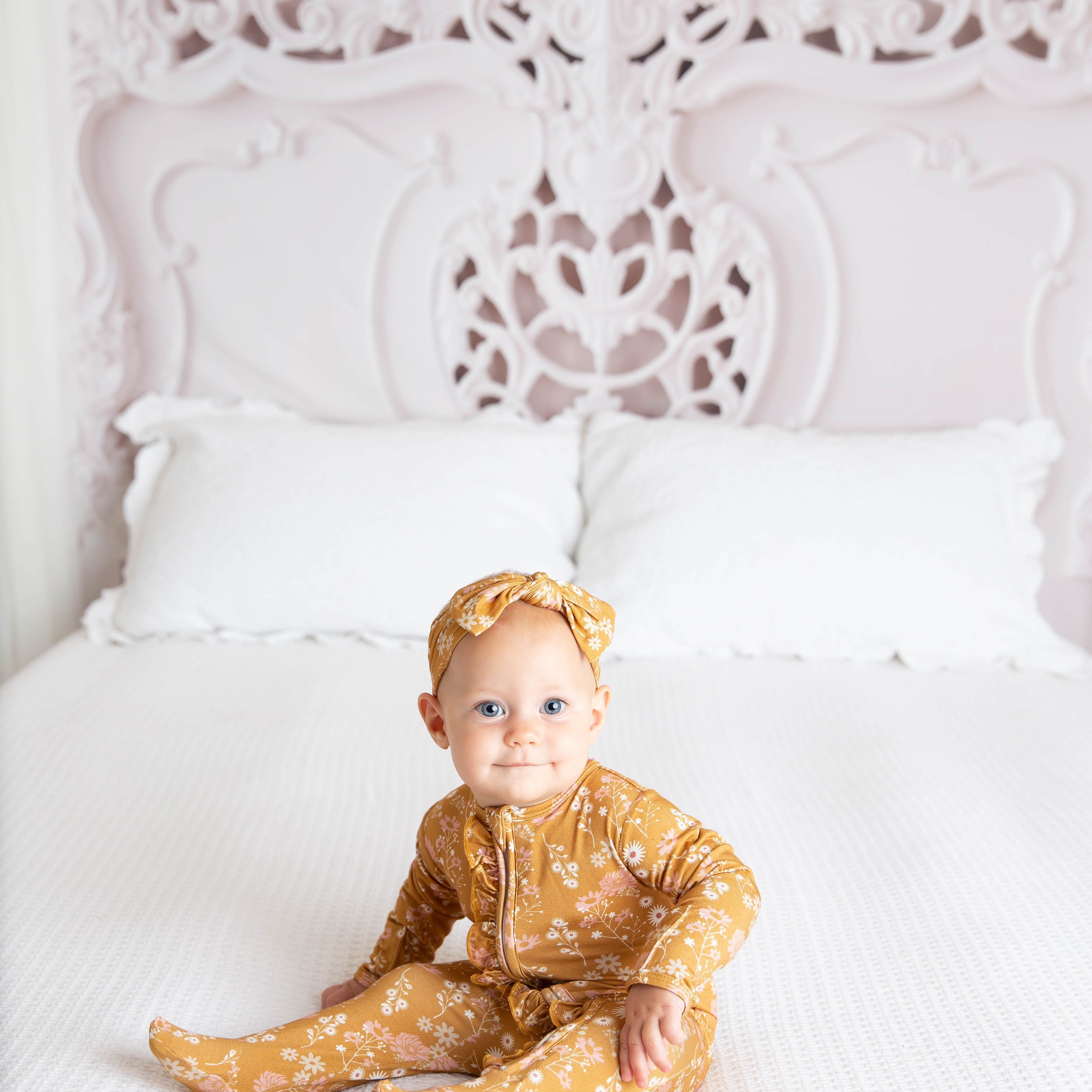 bamboo baby pajamas in mustard floral