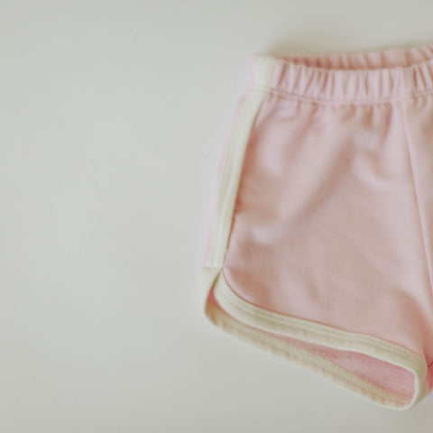 track shorts in light pink