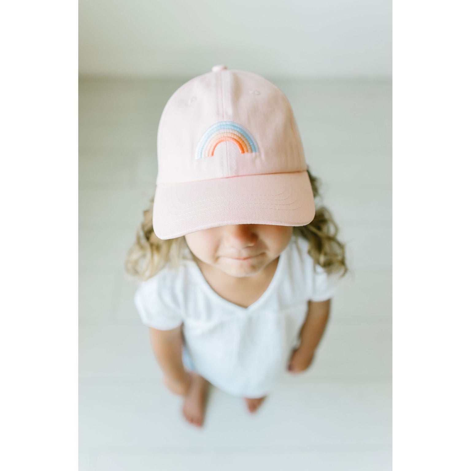 blushing rainbow hat