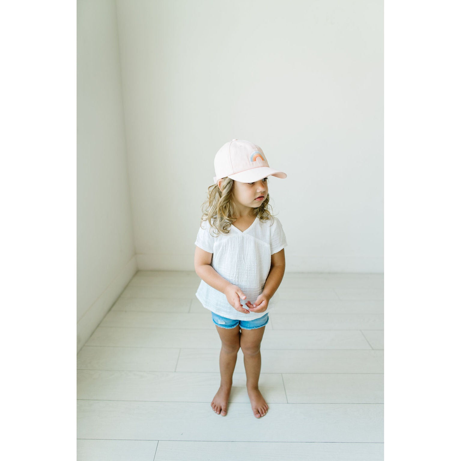 blushing rainbow hat