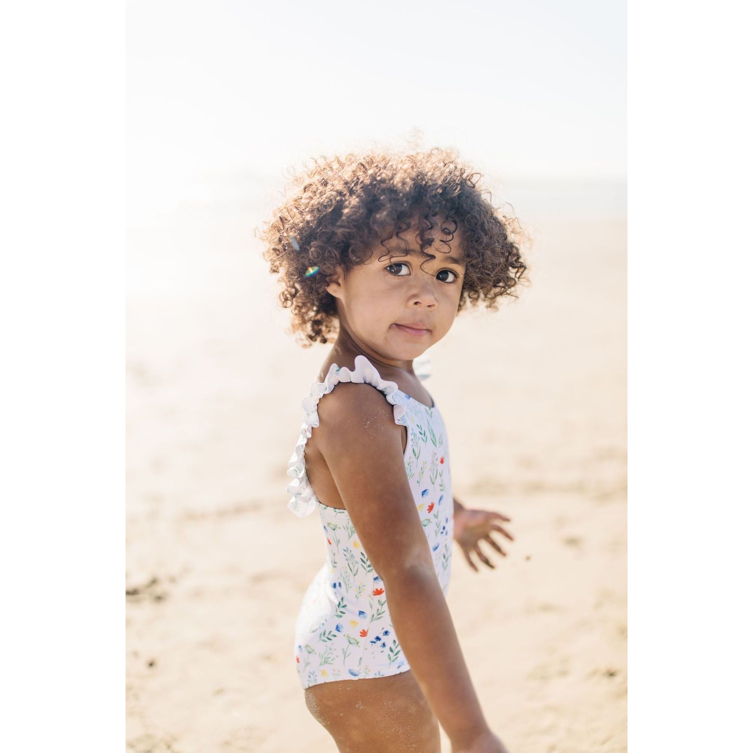 riley ruffle one piece suit in wildflower