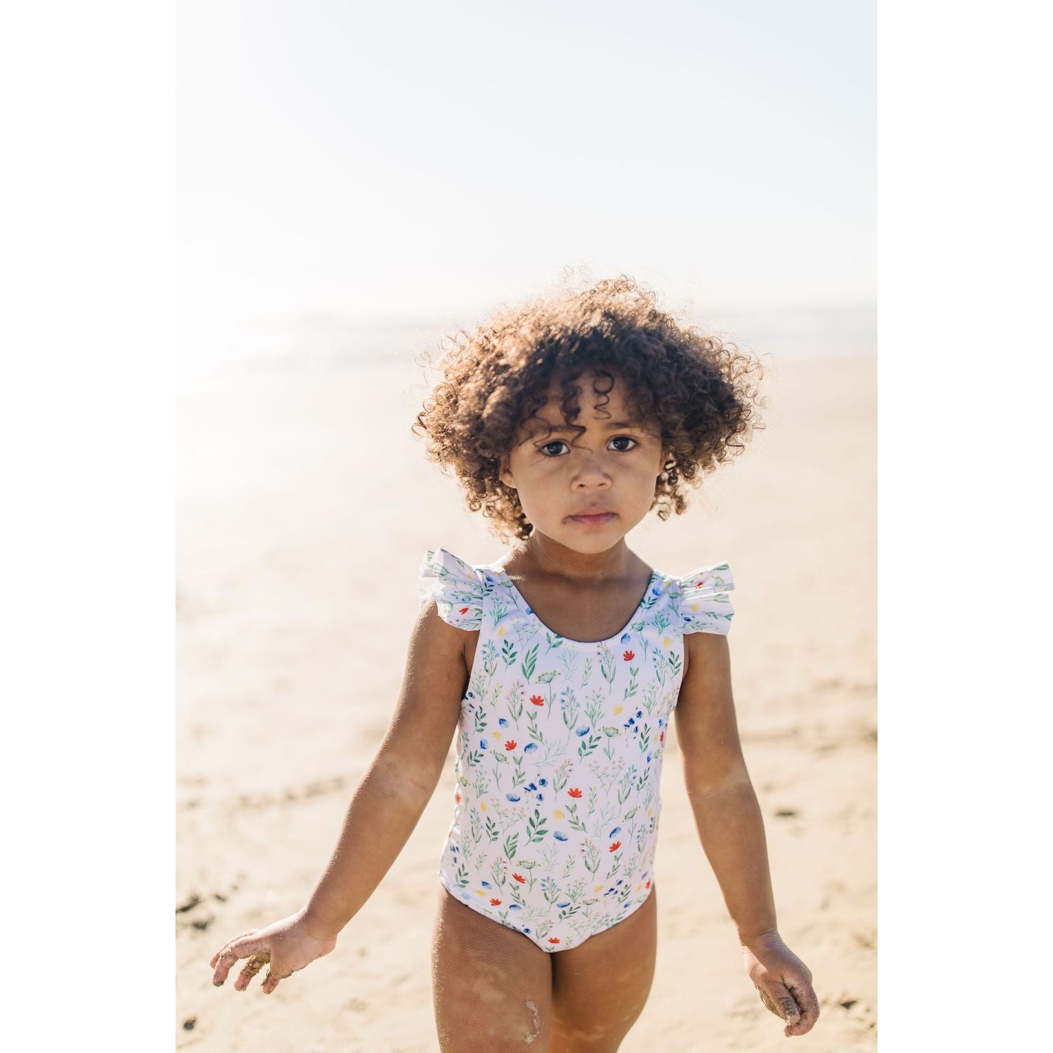 riley ruffle one piece suit in wildflower