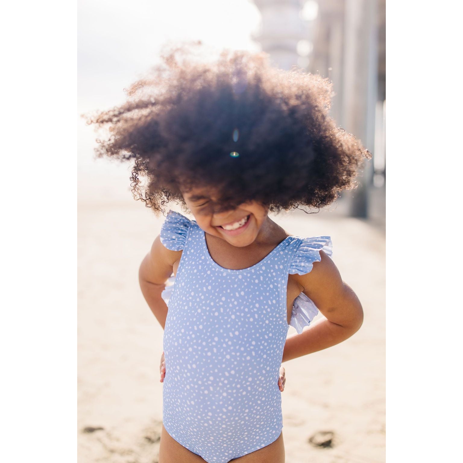 riley one piece suit in terazzo