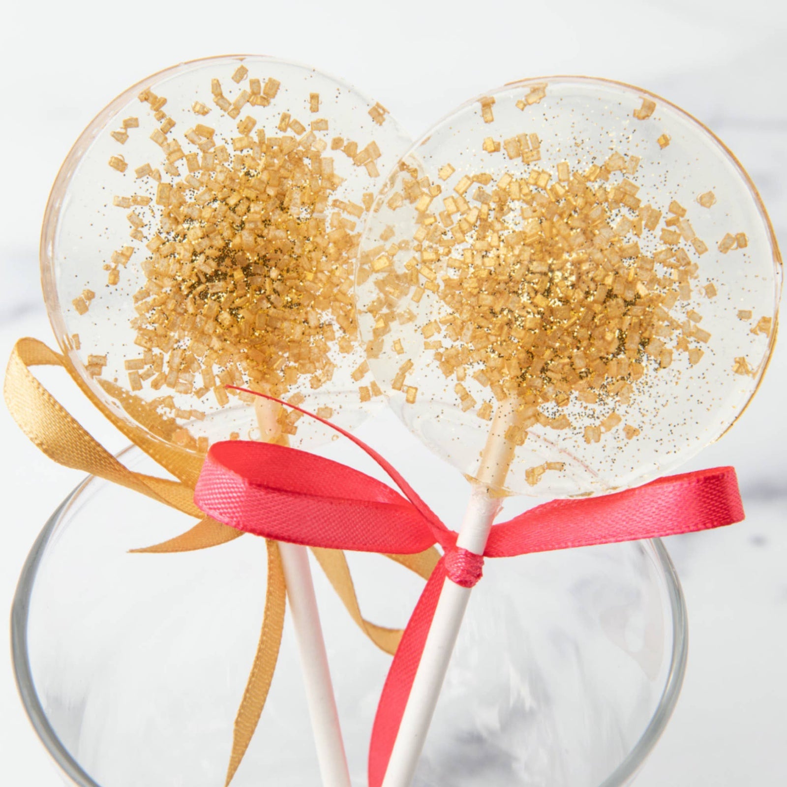 gold sparkle lollipops in black cherry