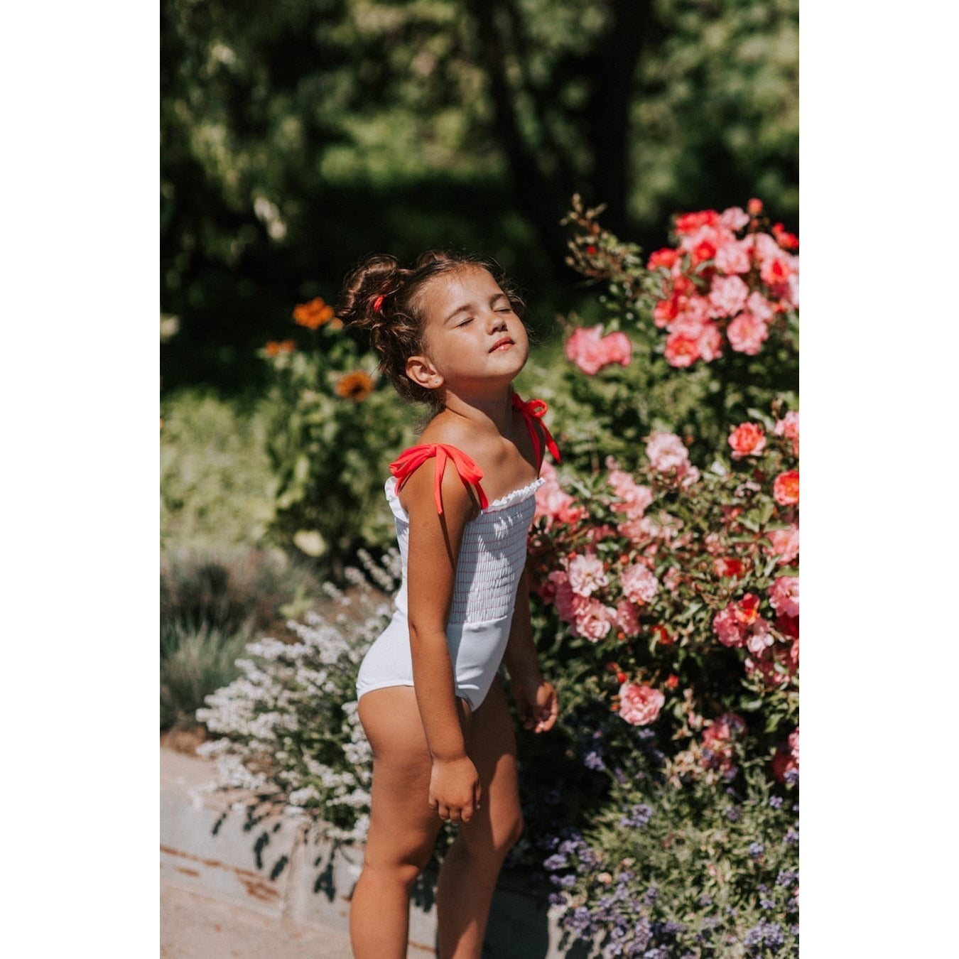 amalia smocked one piece in white/red