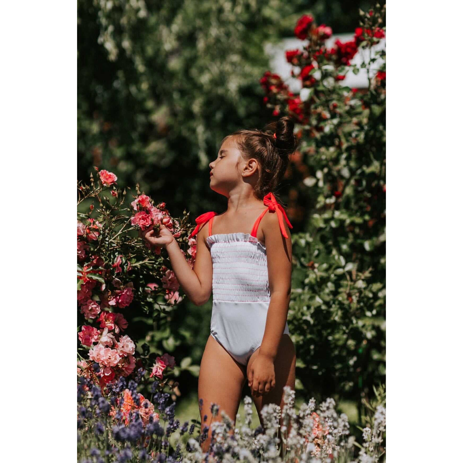 amalia smocked one piece in white/red