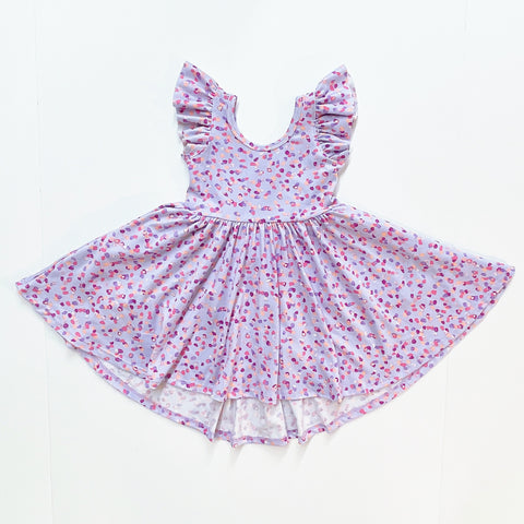 flutter short sleeve twirl dress in purple confetti