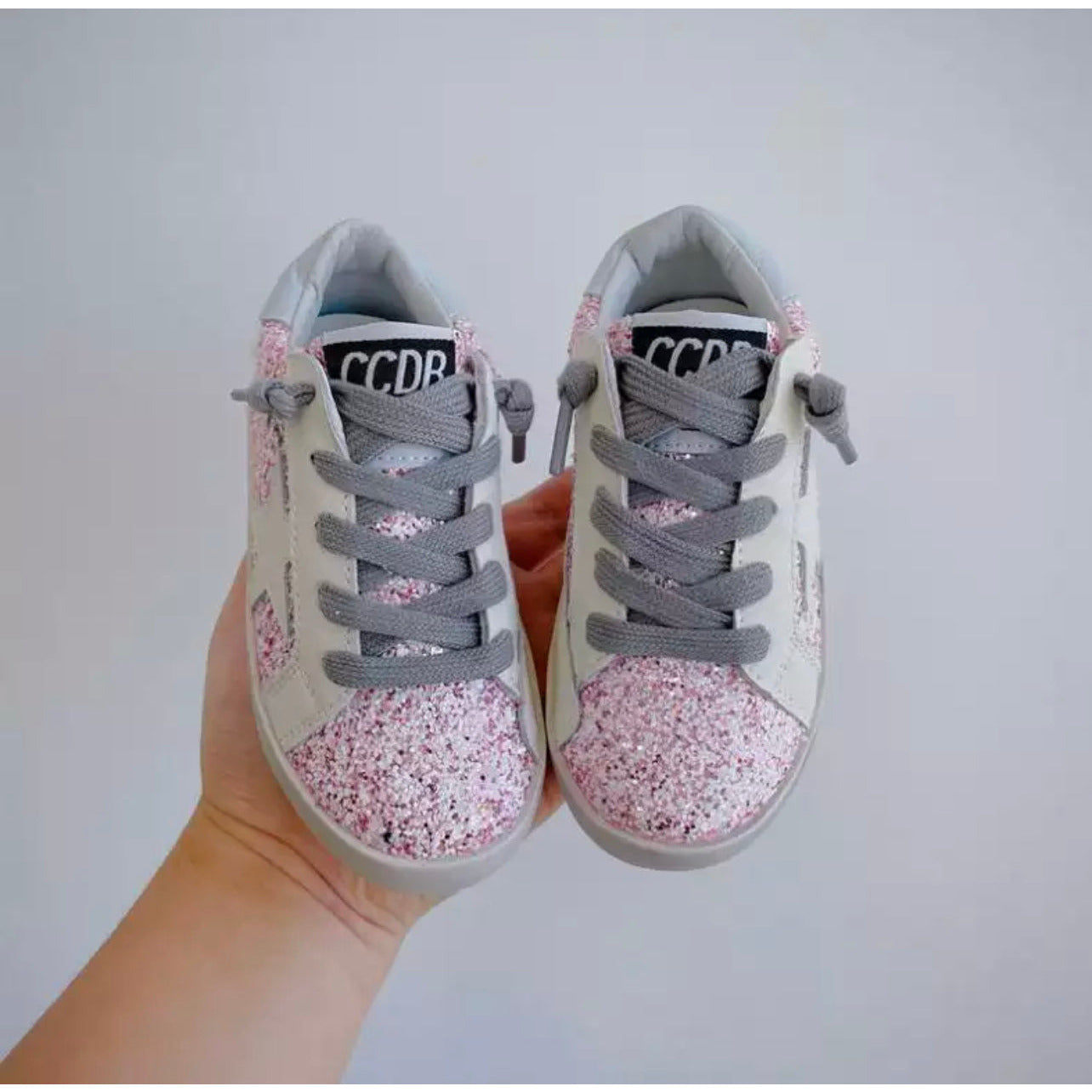pink glitter star sneakers