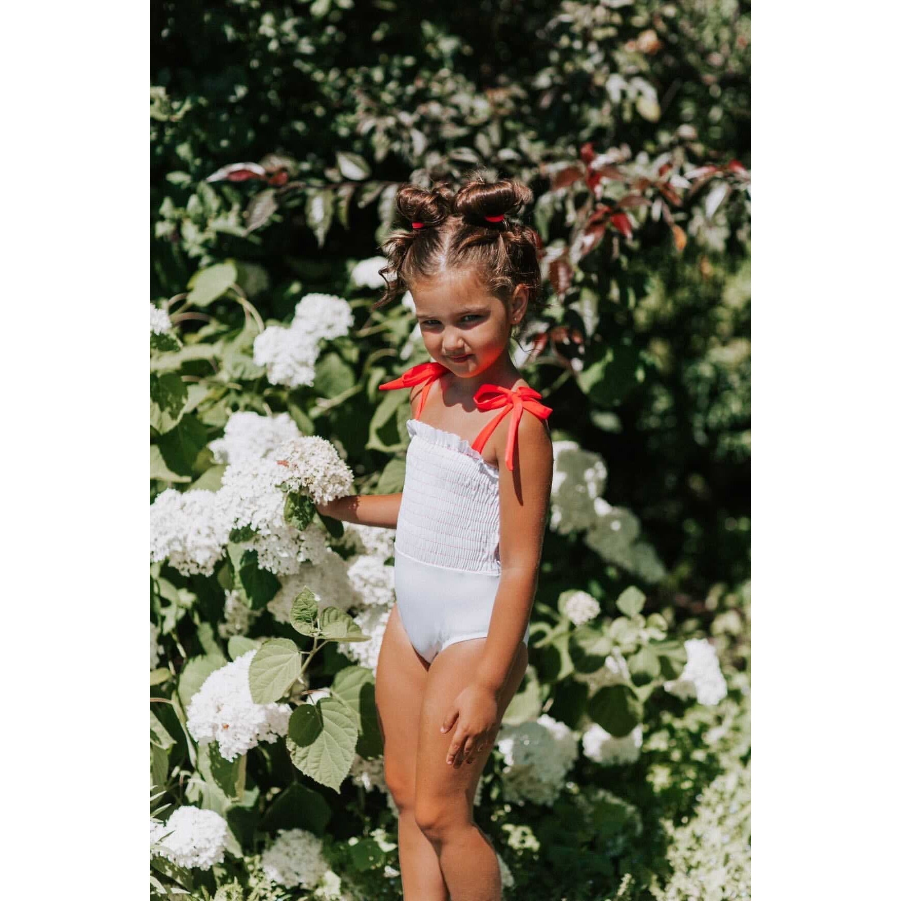 amalia smocked one piece in white/red