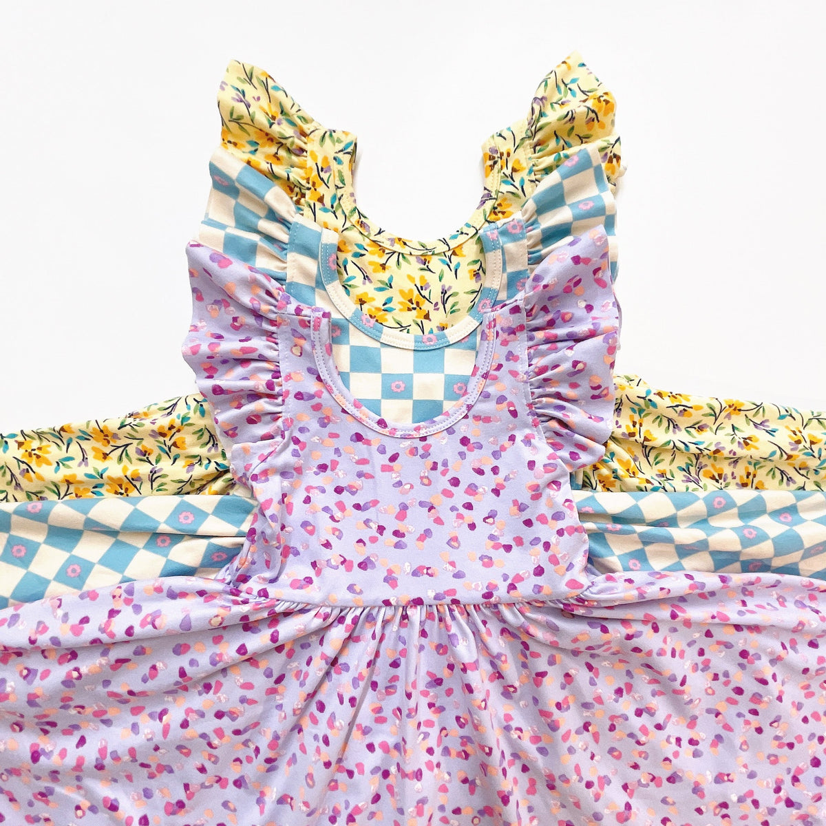 flutter short sleeve twirl dress in purple confetti