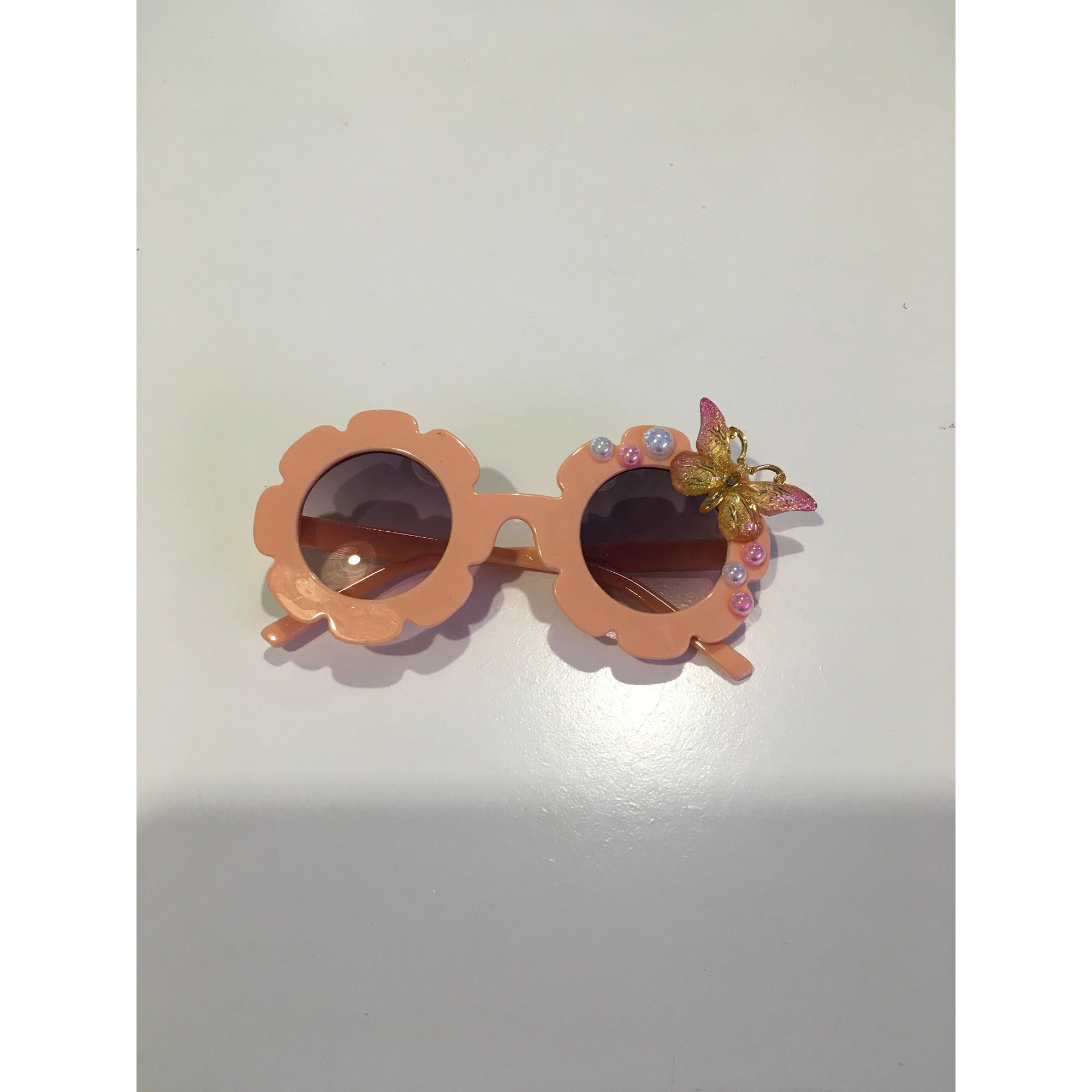 Butterfly pearl sunglasses in peach