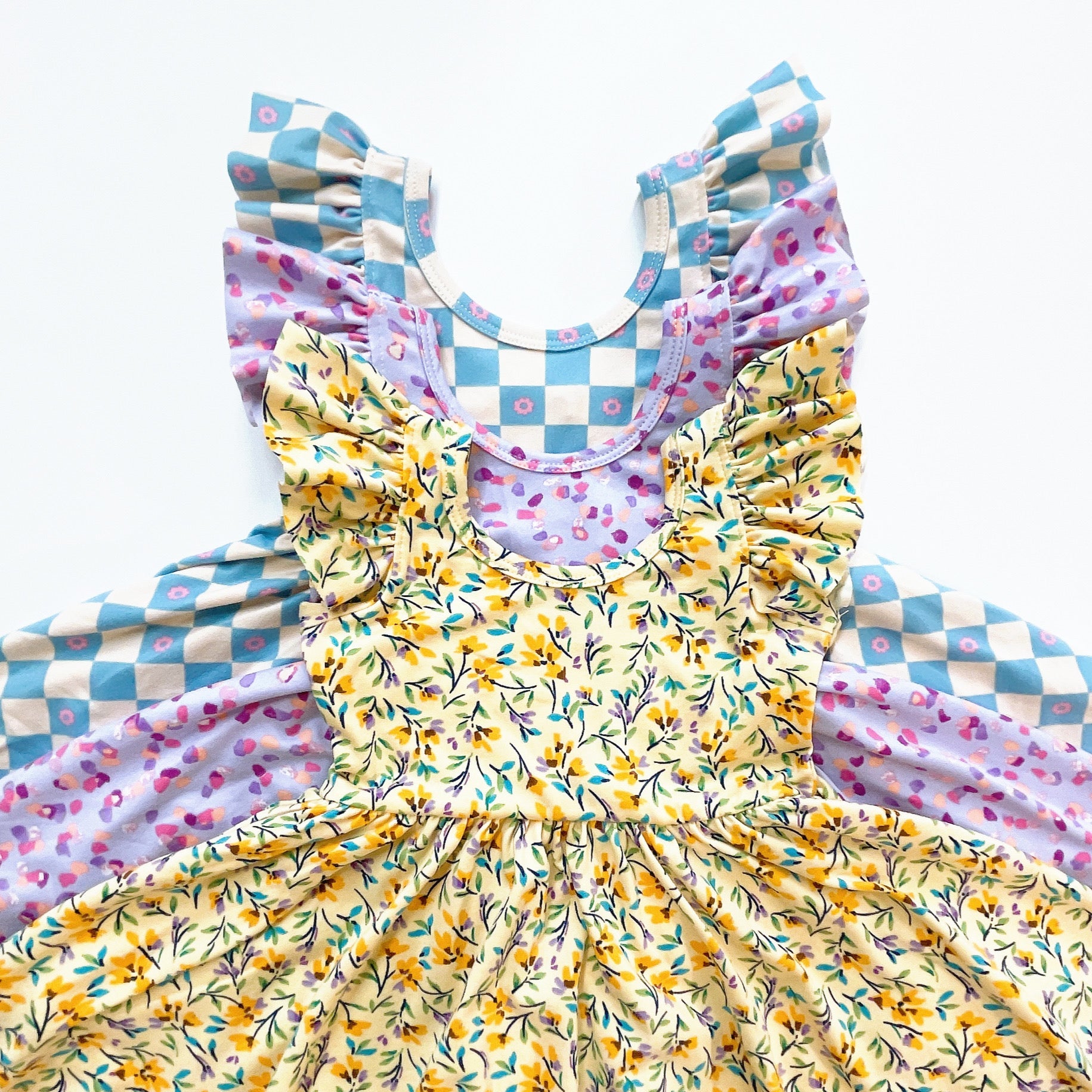 flutter short sleeve twirl dress in yellow floral