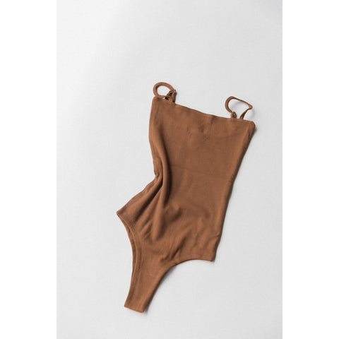 raised by water women’s essential body suit in kauai clay