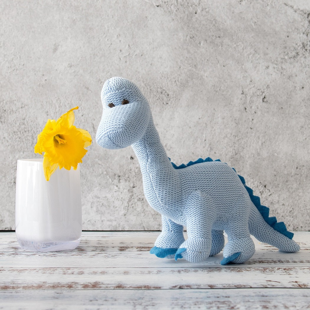 knitted organic cotton blue diplodocus dinosaur baby rattle