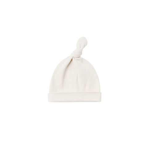 knotted baby hat in ivory