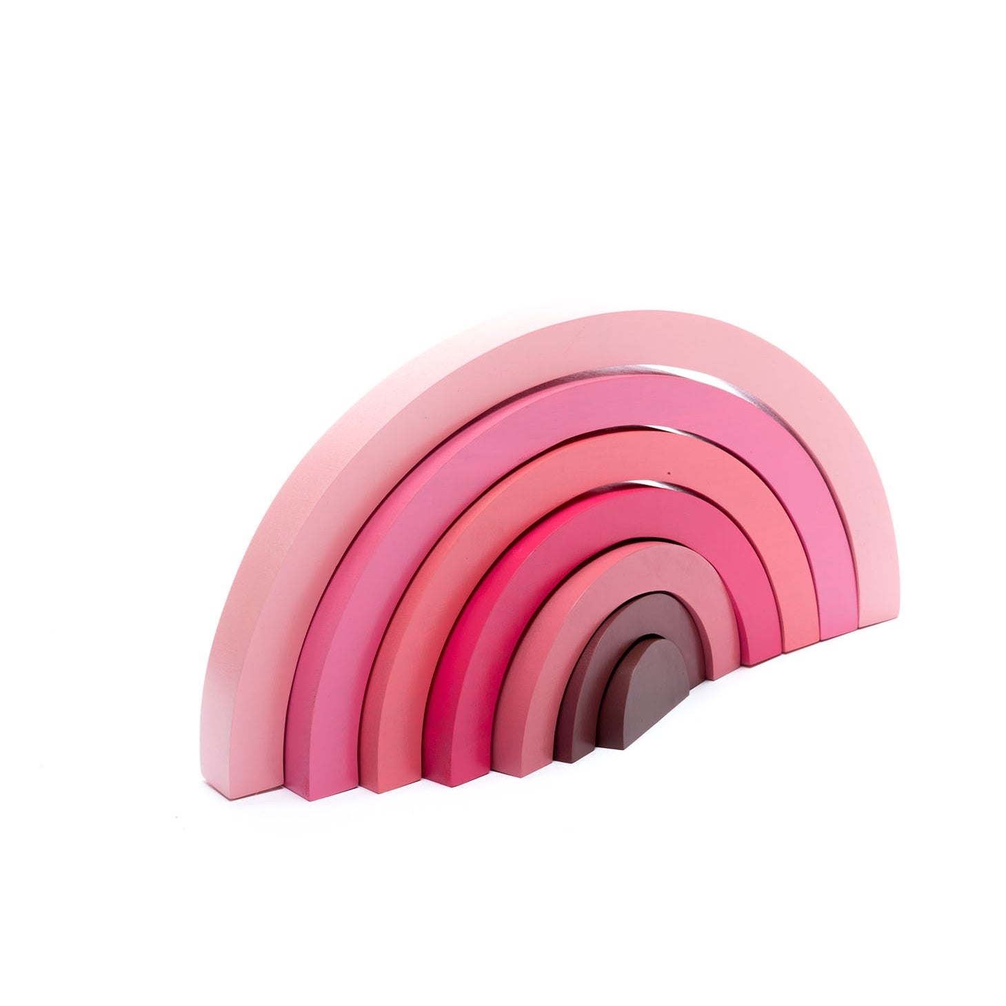 large wood rainbow puzzle toy in shades of pink