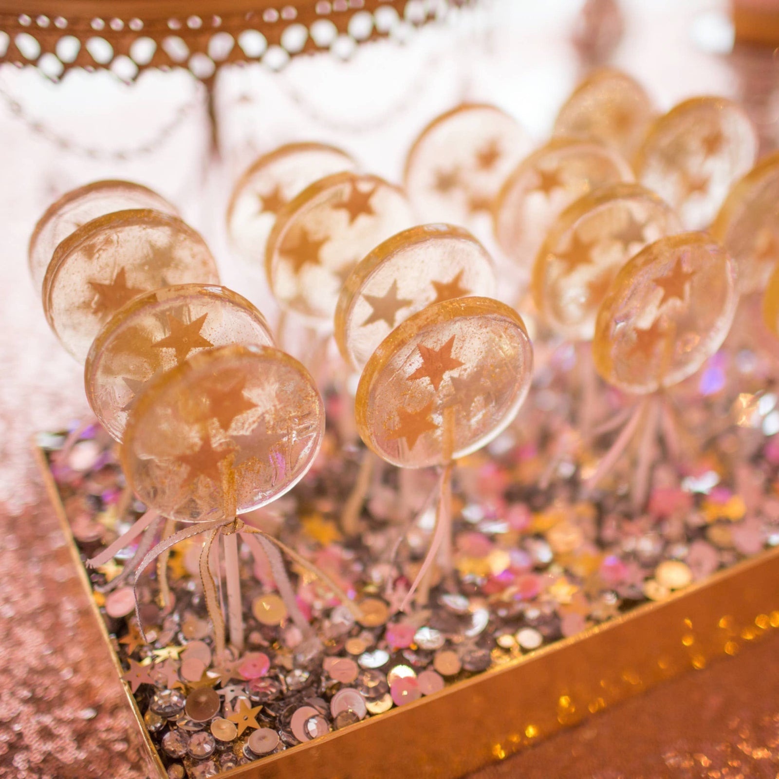 metallic stars lollipops in champagne