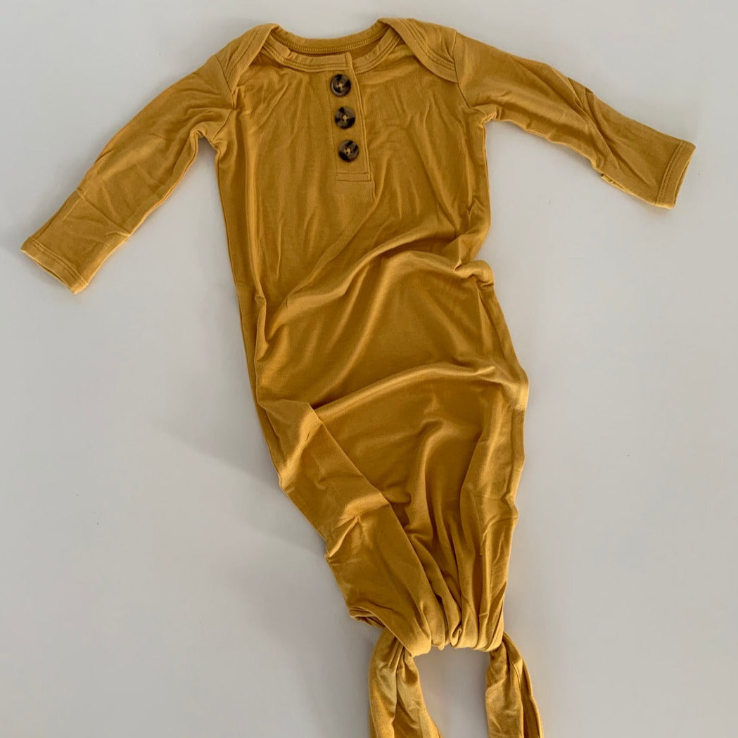 newborn gown in mustard yellow