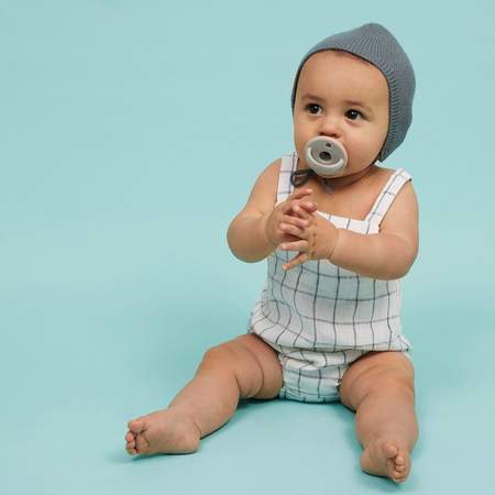 classic pacifier in dove