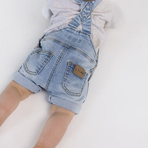 overall shorts in light blue