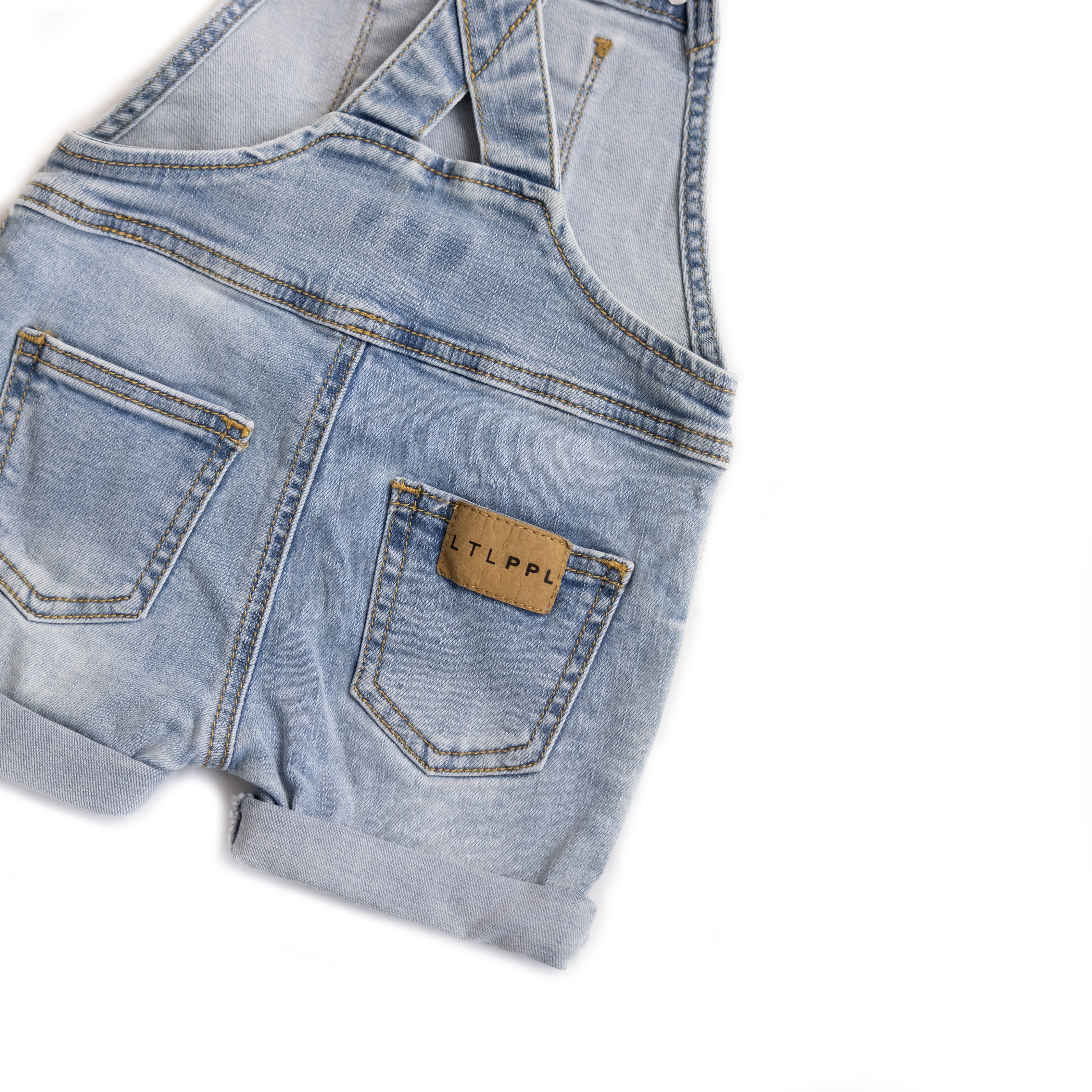 overall shorts in light blue