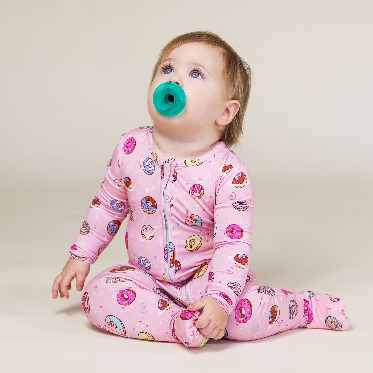pink donut convertible footie pajamas in pink