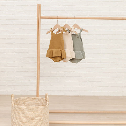 knit ruffle romper in spruce
