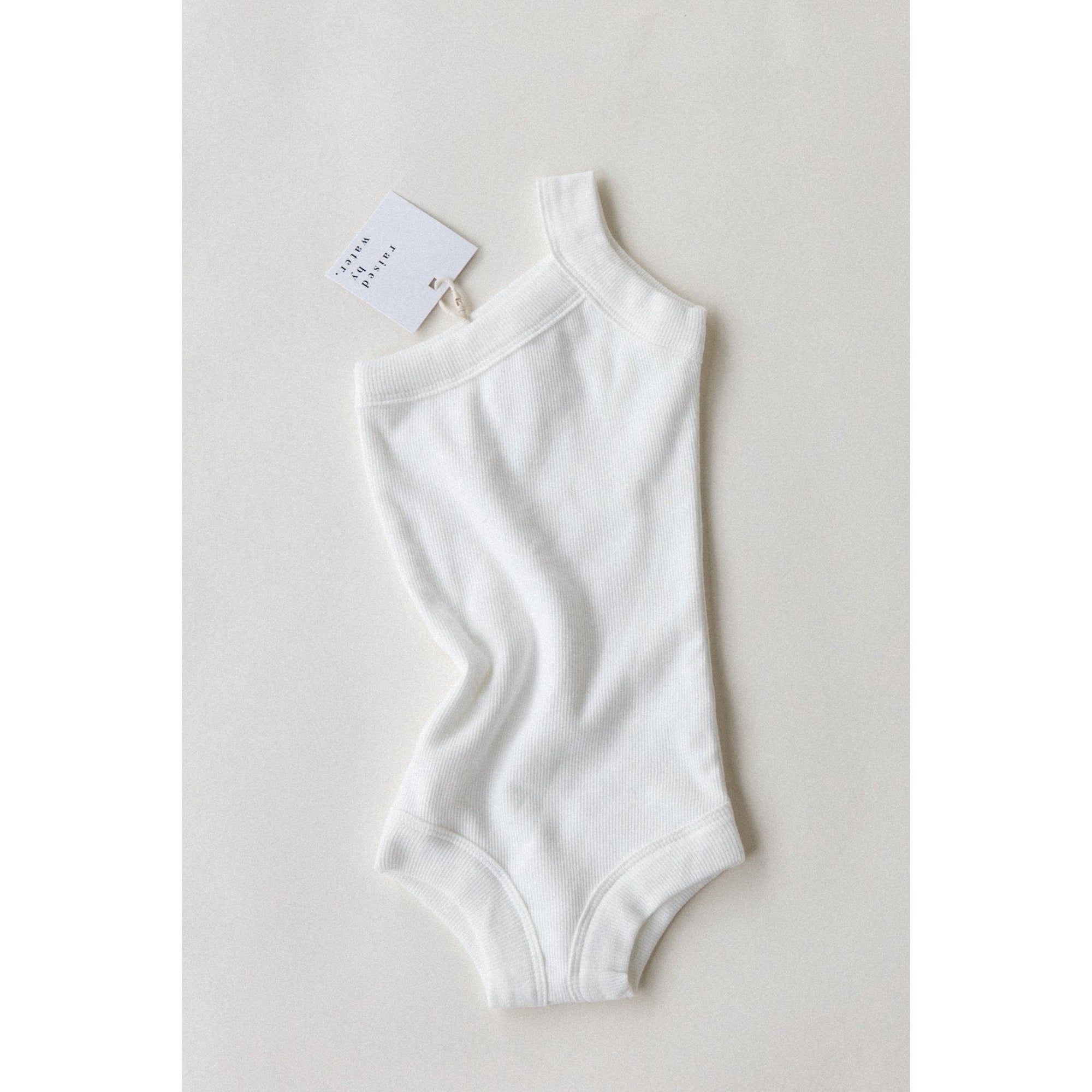 raised by water x shop kai blue one strap body suit
