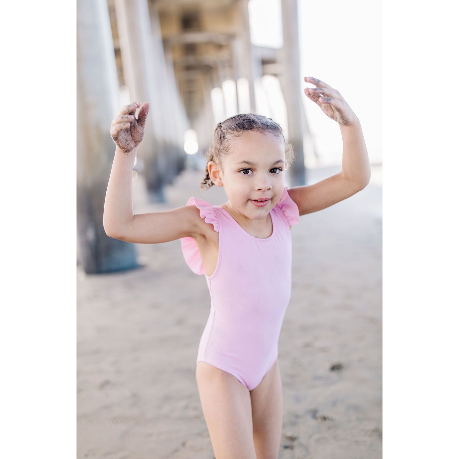 riley ruffle one piece suit in pink