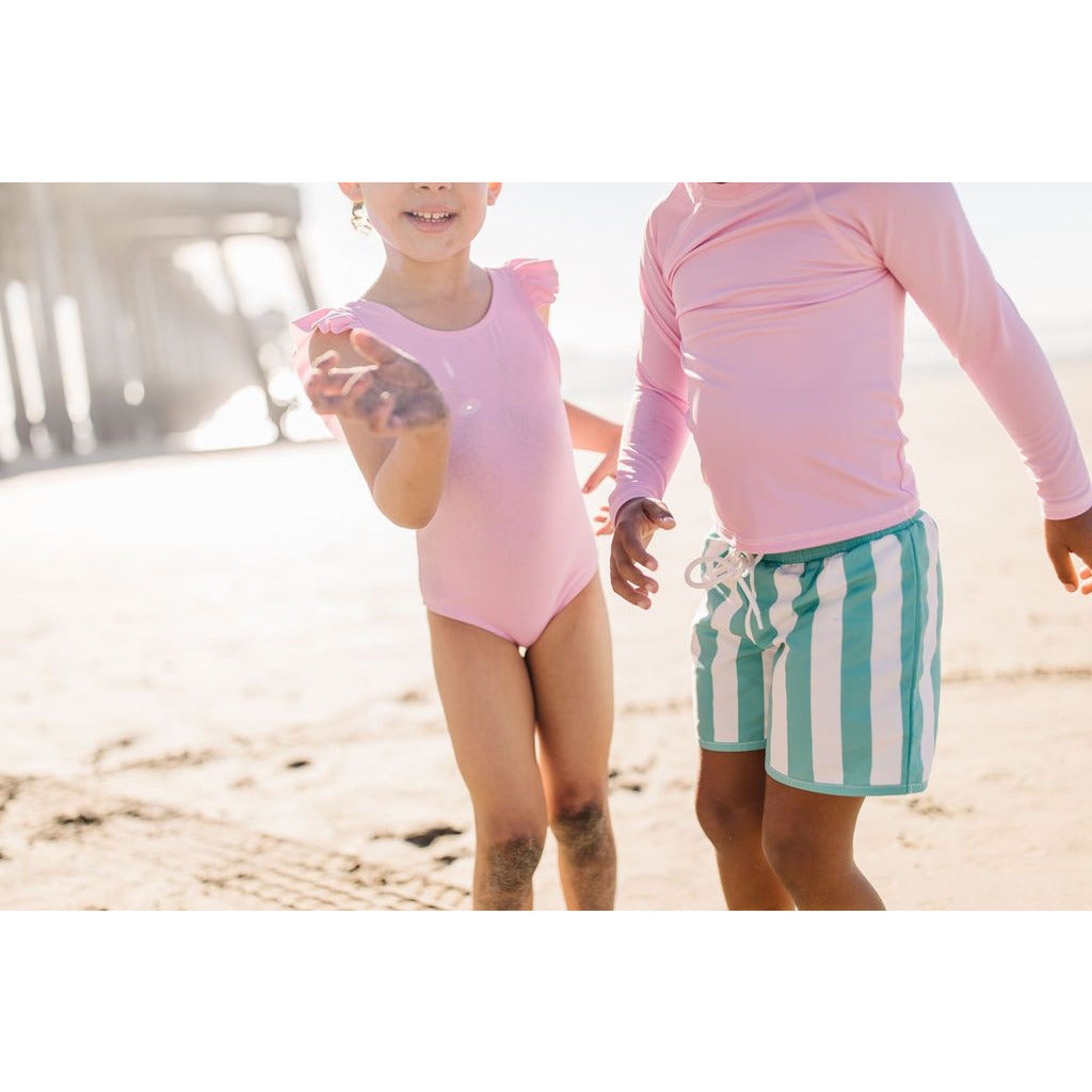 riley ruffle one piece suit in pink