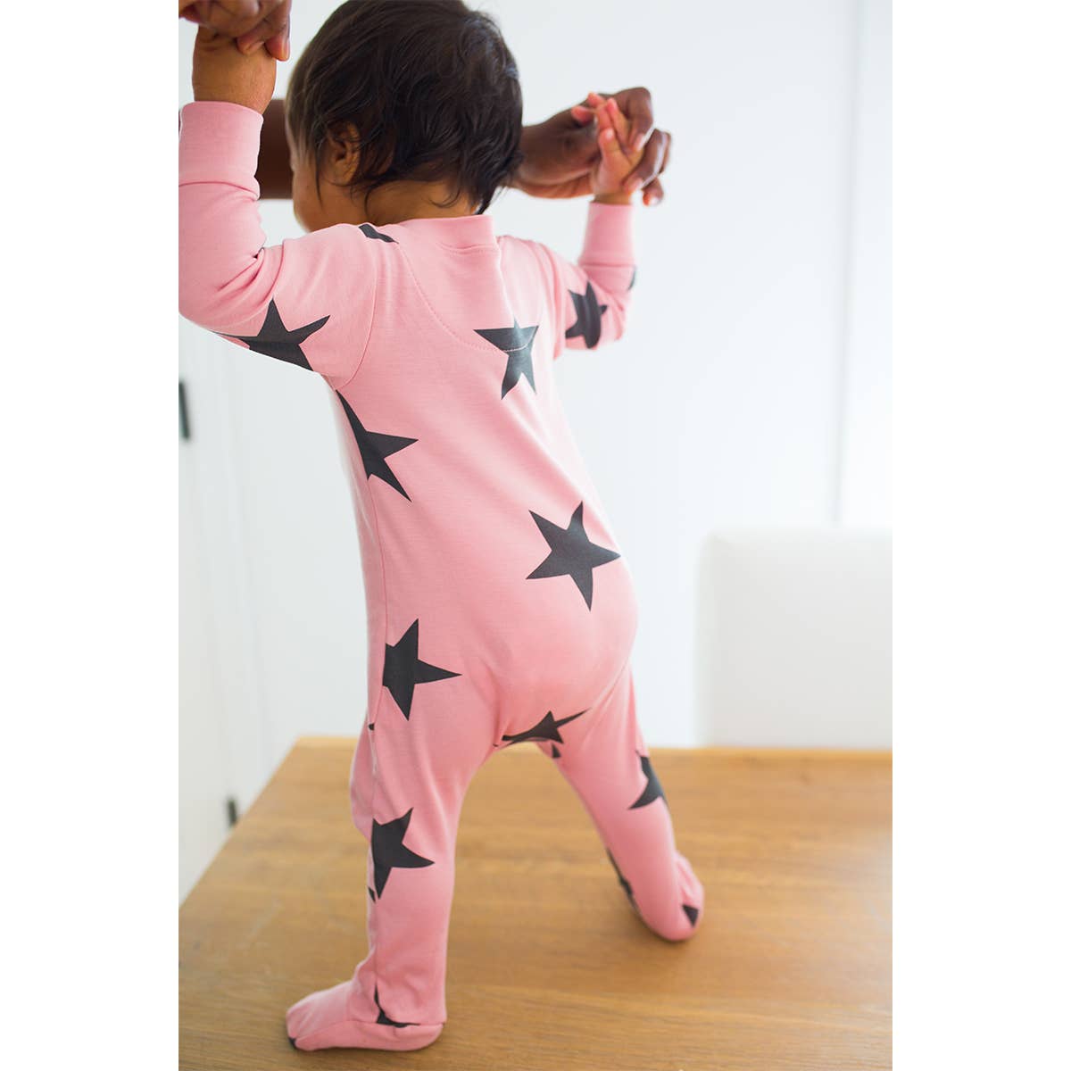 sahara sunset + black star zipper romper