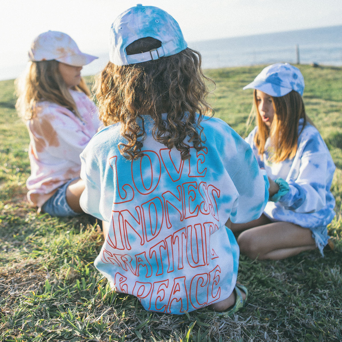 teal kindness tie-dyecrew neck sweatshirt