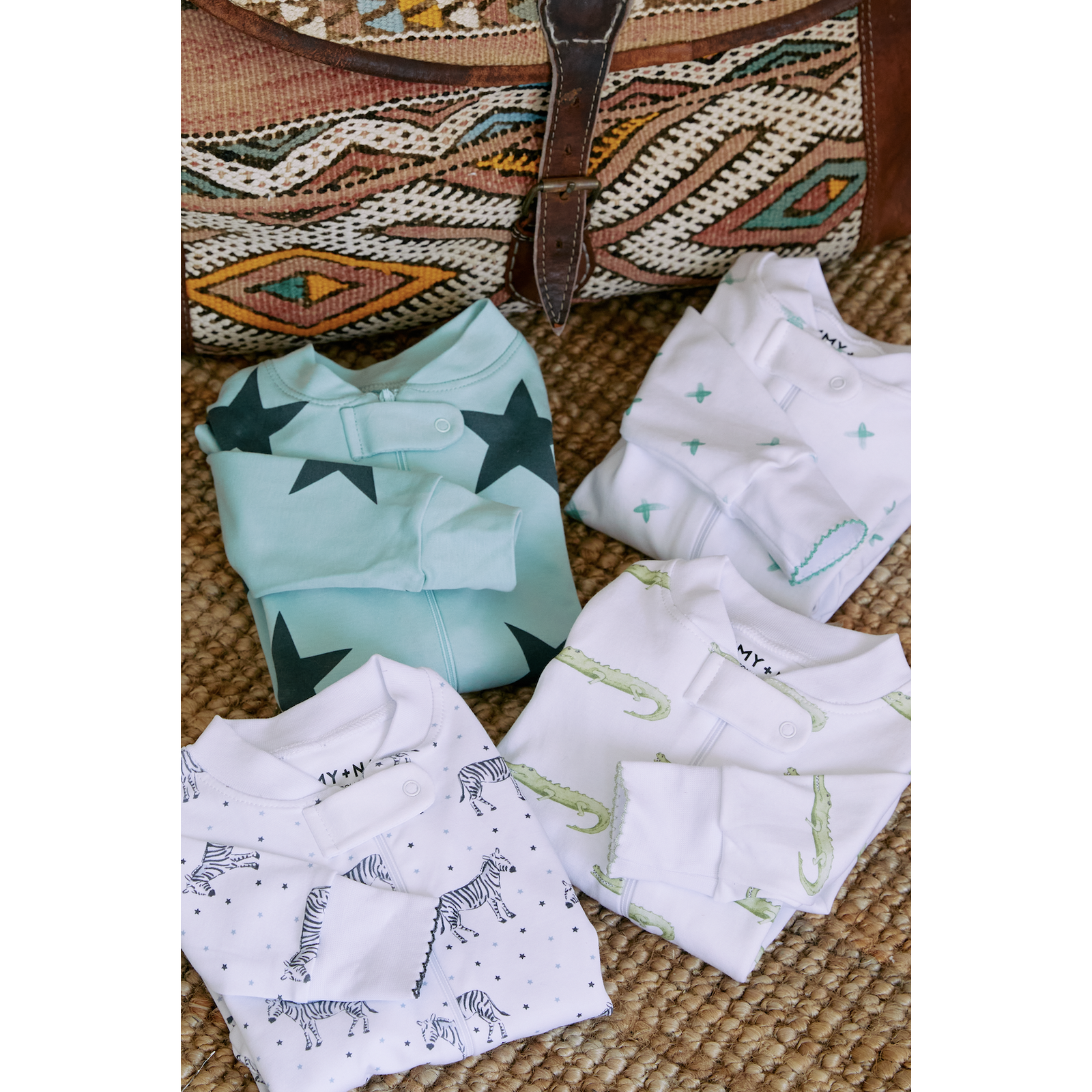 zanzibar green + black star zipper romper